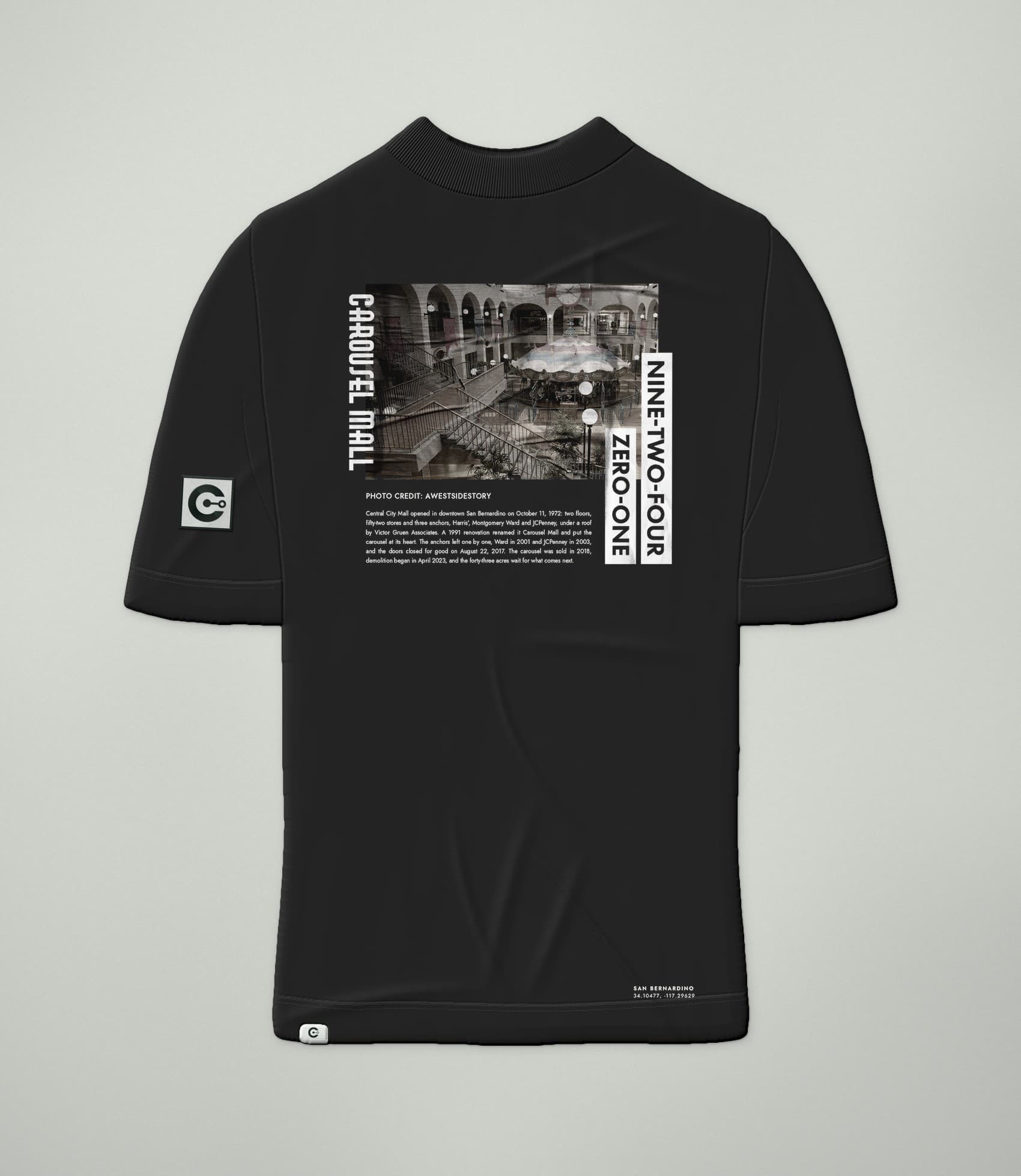 A mockup of the Carousel Mall Tee in Black, front